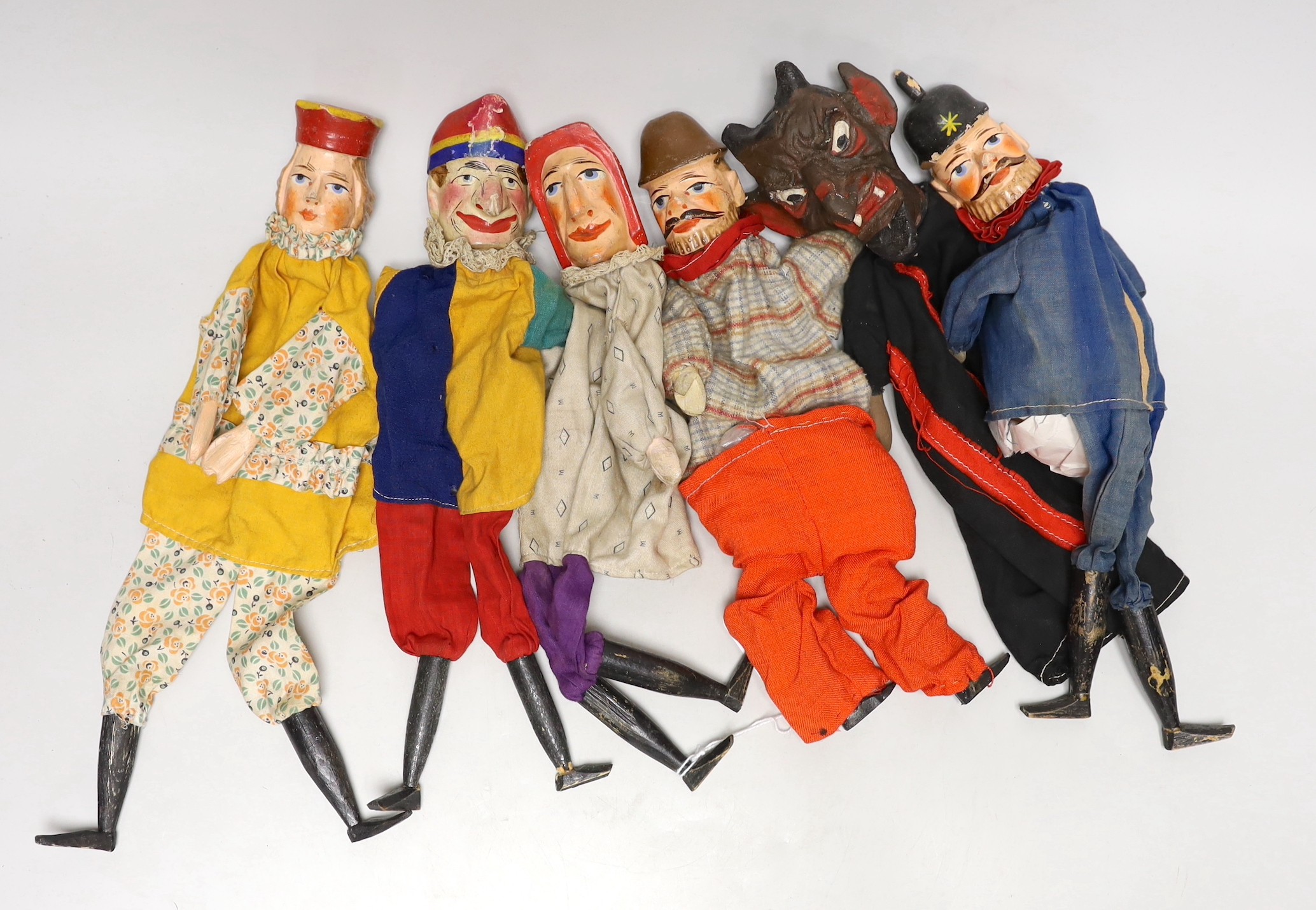 Six various early 20th century wooden Punch character puppets